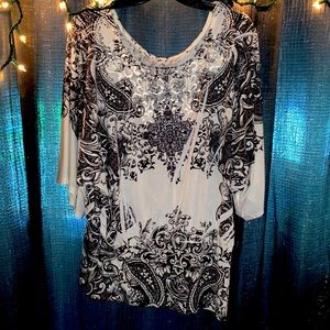 Black and white top with embroidered scooped neck line